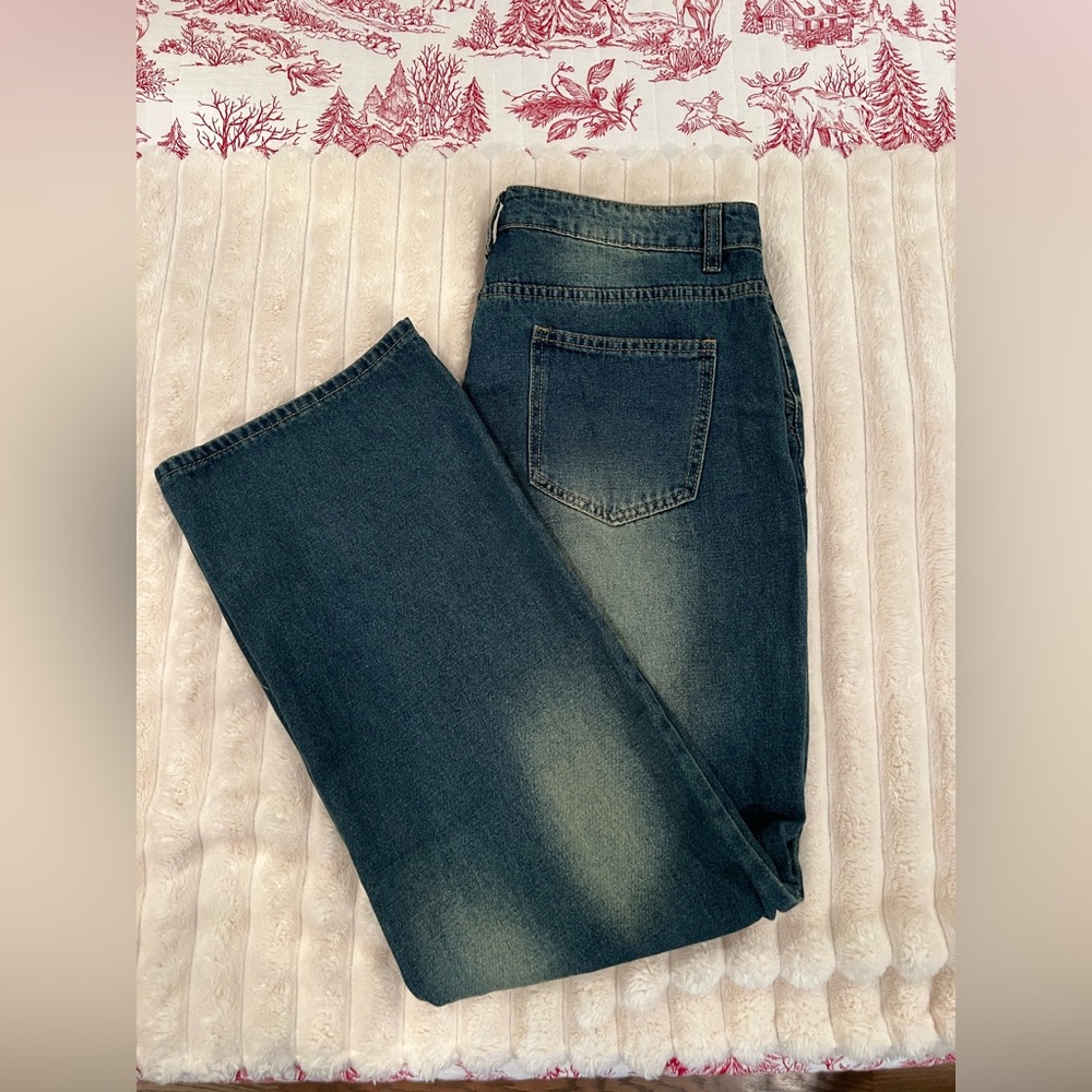 New jeans with button details on front pockets